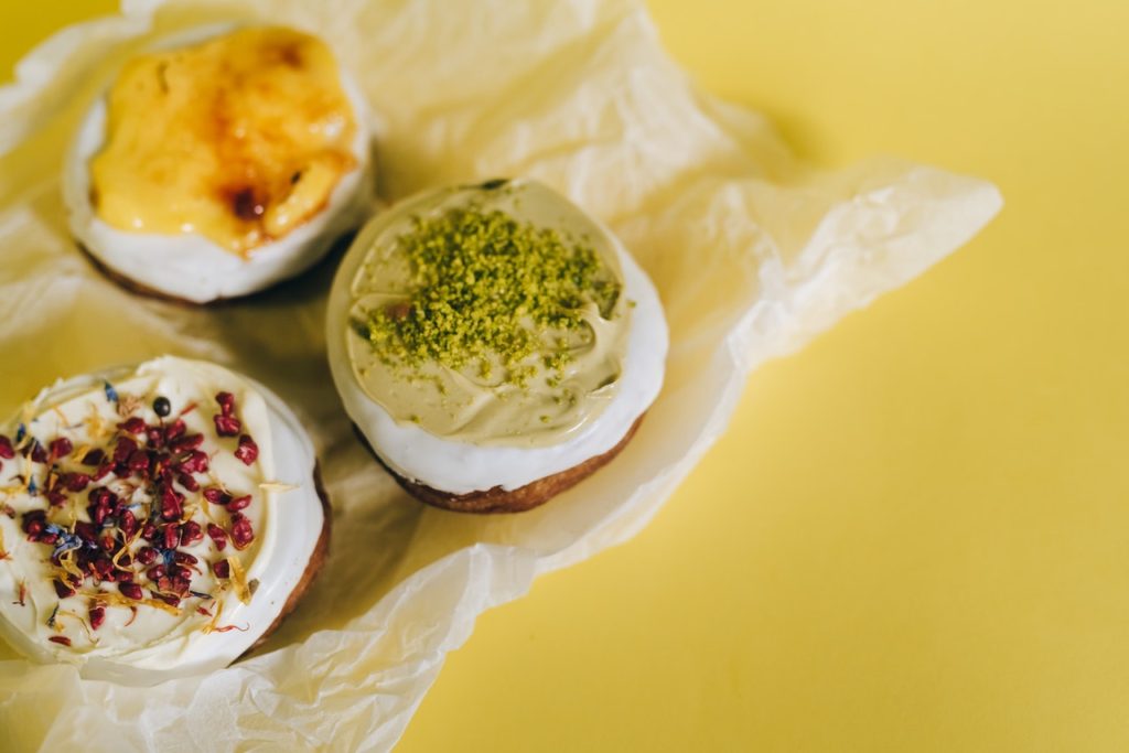 3 donuts on a yellow-green background